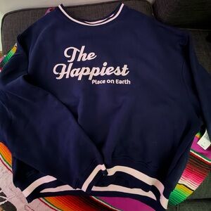 NEW- Disney Navy Blue Sweater Embroidered “The Happiest Place on Earth”